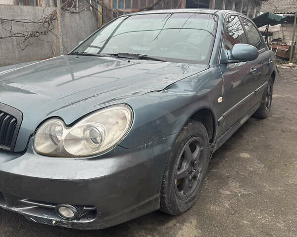 Серый Хендай Соната, объемом двигателя 2 л и пробегом 270 тыс. км за 1699 $, фото 5 на Automoto.ua