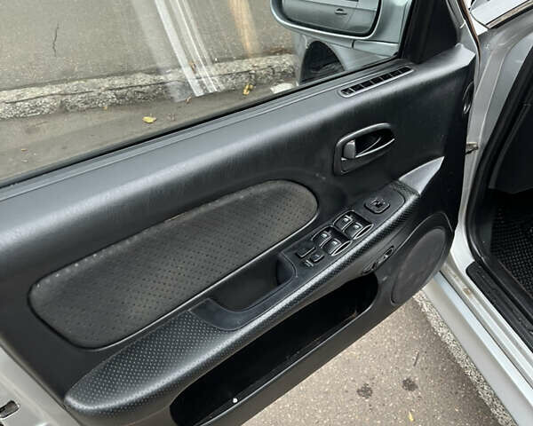 Серый Хендай Соната, объемом двигателя 2 л и пробегом 287 тыс. км за 3700 $, фото 14 на Automoto.ua