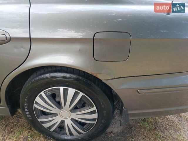 Серый Хендай Соната, объемом двигателя 2.4 л и пробегом 210 тыс. км за 3450 $, фото 2 на Automoto.ua