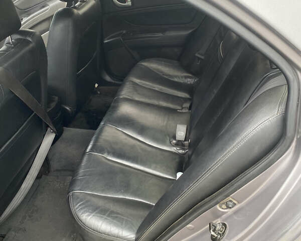 Серый Хендай Соната, объемом двигателя 2 л и пробегом 243 тыс. км за 6500 $, фото 7 на Automoto.ua