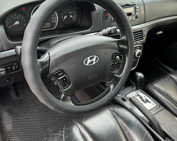 Серый Хендай Соната, объемом двигателя 2.36 л и пробегом 307 тыс. км за 5550 $, фото 29 на Automoto.ua