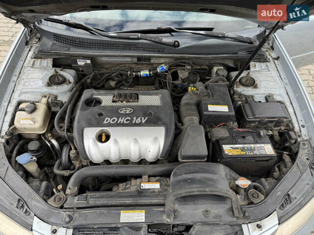 Серый Хендай Соната, объемом двигателя 2.36 л и пробегом 307 тыс. км за 5550 $, фото 46 на Automoto.ua