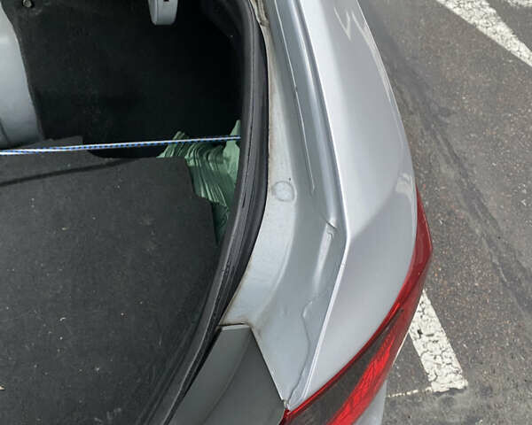 Серый Хендай Соната, объемом двигателя 2 л и пробегом 373 тыс. км за 7300 $, фото 16 на Automoto.ua