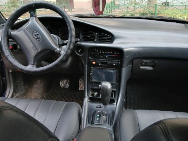 Синий Хендай Соната, объемом двигателя 3 л и пробегом 200 тыс. км за 1000 $, фото 2 на Automoto.ua