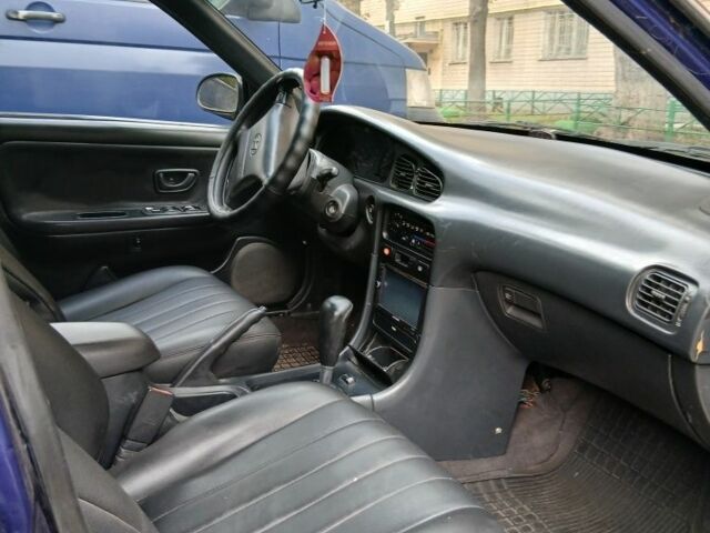 Синий Хендай Соната, объемом двигателя 3 л и пробегом 200 тыс. км за 1000 $, фото 7 на Automoto.ua