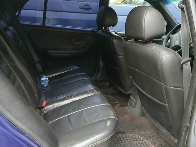 Синий Хендай Соната, объемом двигателя 3 л и пробегом 200 тыс. км за 1000 $, фото 6 на Automoto.ua