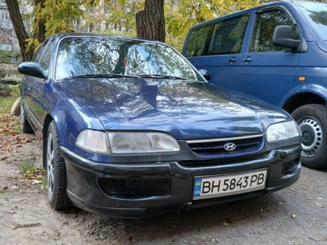 Синий Хендай Соната, объемом двигателя 3 л и пробегом 200 тыс. км за 1000 $, фото 3 на Automoto.ua