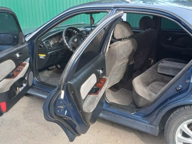 Синий Хендай Соната, объемом двигателя 2.7 л и пробегом 242 тыс. км за 3399 $, фото 7 на Automoto.ua