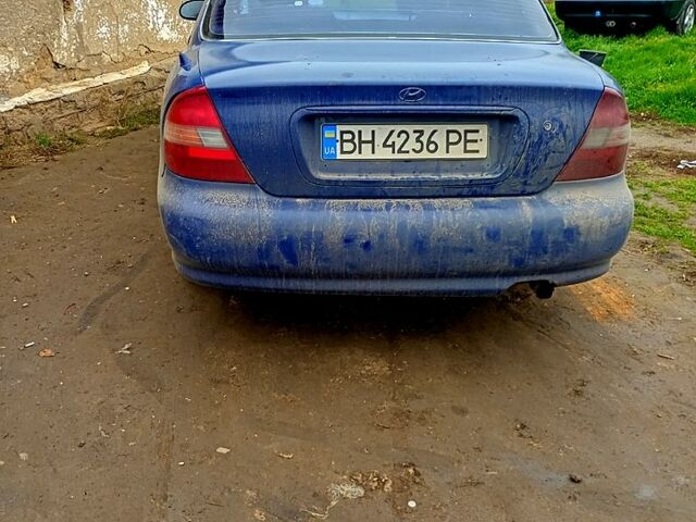 Синий Хендай Соната, объемом двигателя 2 л и пробегом 100 тыс. км за 1500 $, фото 1 на Automoto.ua