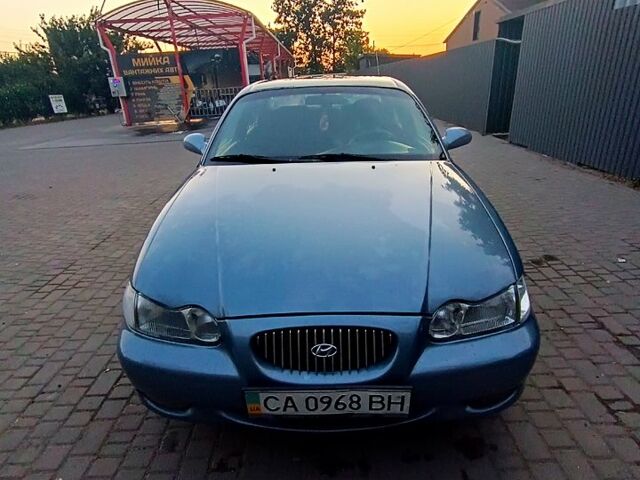 Синий Хендай Соната, объемом двигателя 2 л и пробегом 130 тыс. км за 2500 $, фото 4 на Automoto.ua