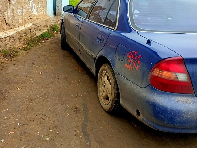 Синий Хендай Соната, объемом двигателя 2 л и пробегом 100 тыс. км за 1500 $, фото 2 на Automoto.ua