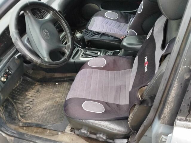 Синий Хендай Соната, объемом двигателя 2 л и пробегом 3 тыс. км за 452 $, фото 6 на Automoto.ua