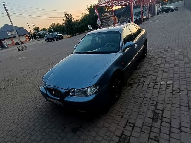 Синий Хендай Соната, объемом двигателя 2 л и пробегом 130 тыс. км за 2500 $, фото 2 на Automoto.ua