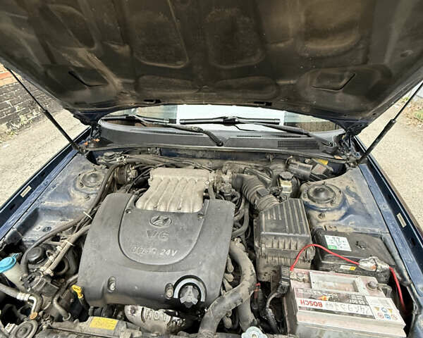 Синий Хендай Соната, объемом двигателя 2.7 л и пробегом 176 тыс. км за 3500 $, фото 7 на Automoto.ua