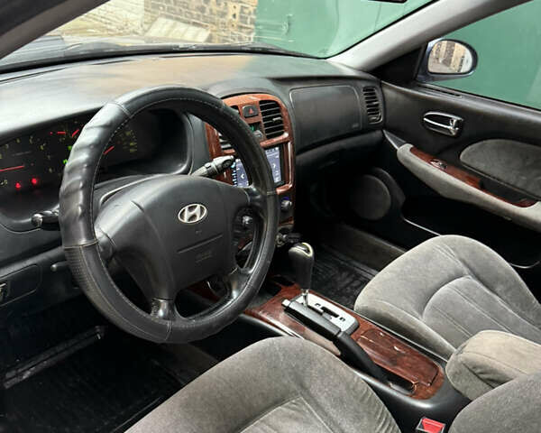 Синий Хендай Соната, объемом двигателя 2.7 л и пробегом 176 тыс. км за 3500 $, фото 8 на Automoto.ua