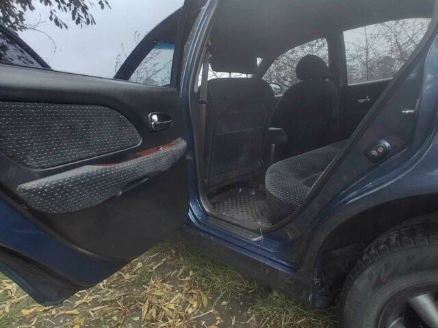 Синий Хендай Соната, объемом двигателя 2 л и пробегом 144 тыс. км за 2200 $, фото 7 на Automoto.ua