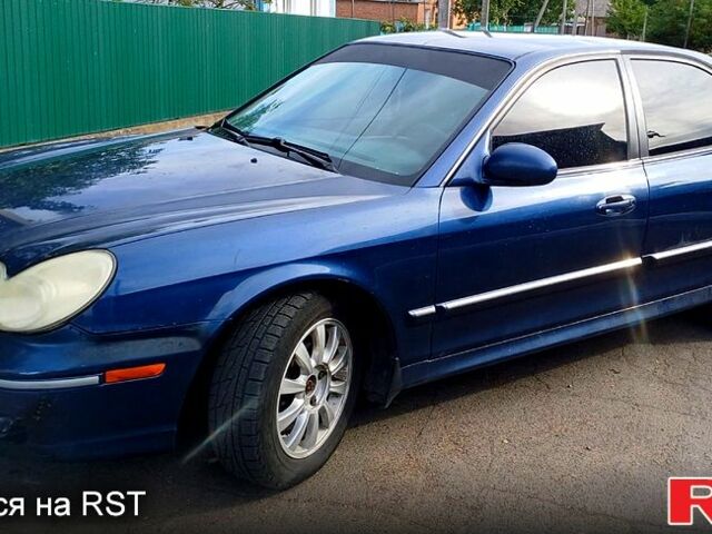 Синий Хендай Соната, объемом двигателя 2.7 л и пробегом 242 тыс. км за 3380 $, фото 4 на Automoto.ua