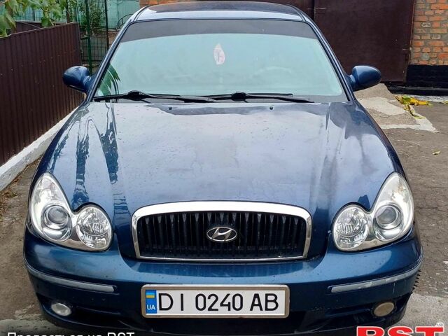 Синий Хендай Соната, объемом двигателя 2.7 л и пробегом 242 тыс. км за 3380 $, фото 5 на Automoto.ua