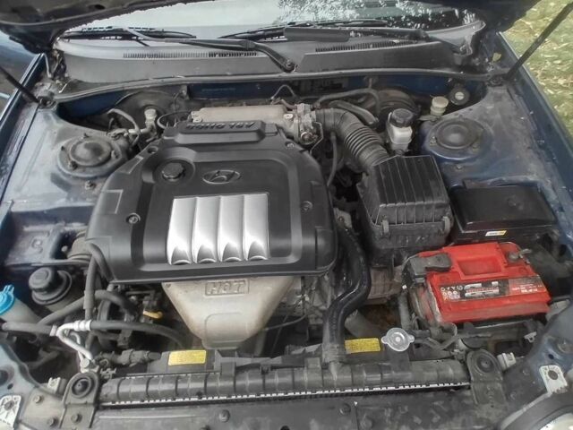 Синий Хендай Соната, объемом двигателя 2 л и пробегом 144 тыс. км за 2200 $, фото 12 на Automoto.ua