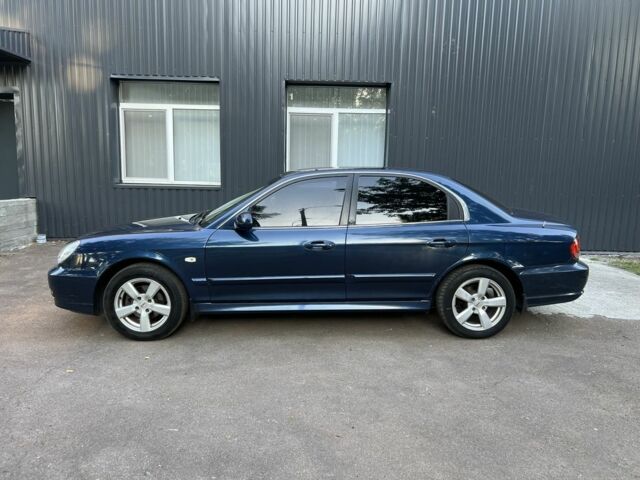 Синий Хендай Соната, объемом двигателя 2 л и пробегом 344 тыс. км за 3000 $, фото 4 на Automoto.ua