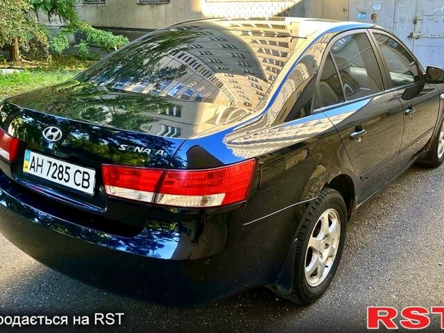 Синий Хендай Соната, объемом двигателя 2.4 л и пробегом 240 тыс. км за 3500 $, фото 2 на Automoto.ua