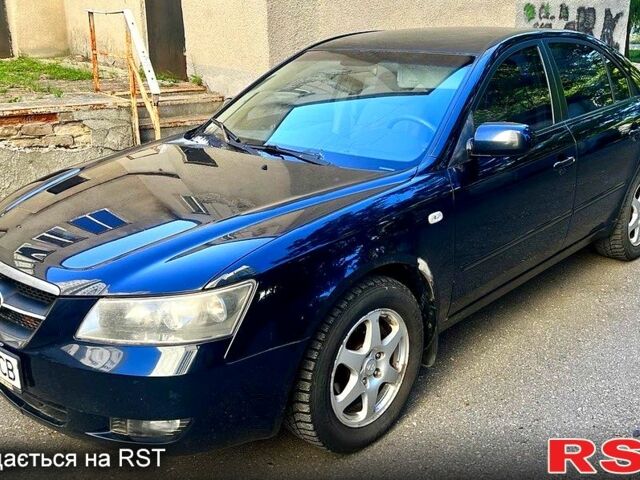 Синий Хендай Соната, объемом двигателя 2.4 л и пробегом 240 тыс. км за 3500 $, фото 1 на Automoto.ua