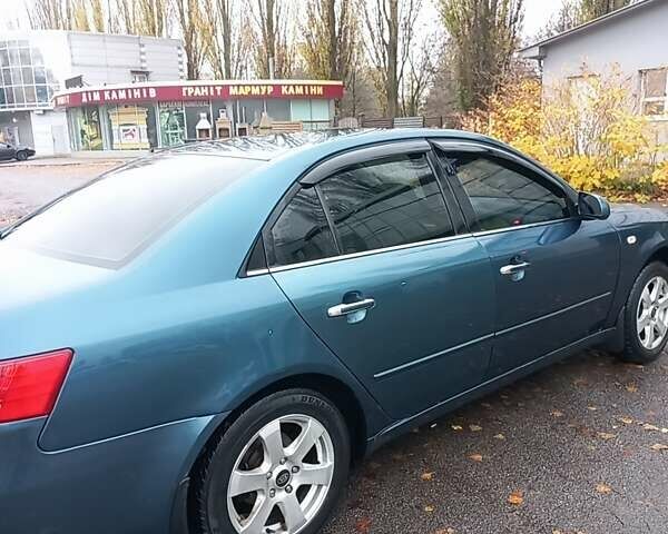 Синий Хендай Соната, объемом двигателя 2.36 л и пробегом 357 тыс. км за 4400 $, фото 13 на Automoto.ua