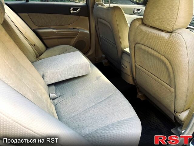 Синий Хендай Соната, объемом двигателя 2.4 л и пробегом 240 тыс. км за 3500 $, фото 5 на Automoto.ua