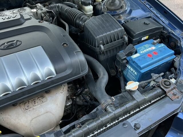 Синий Хендай Соната, объемом двигателя 2 л и пробегом 344 тыс. км за 3000 $, фото 14 на Automoto.ua