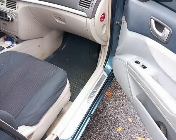 Синий Хендай Соната, объемом двигателя 2.36 л и пробегом 357 тыс. км за 4400 $, фото 5 на Automoto.ua
