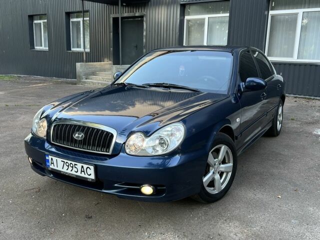 Синий Хендай Соната, объемом двигателя 2 л и пробегом 344 тыс. км за 3000 $, фото 1 на Automoto.ua