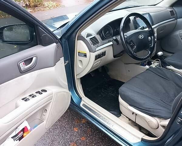 Синий Хендай Соната, объемом двигателя 2.36 л и пробегом 357 тыс. км за 4400 $, фото 8 на Automoto.ua