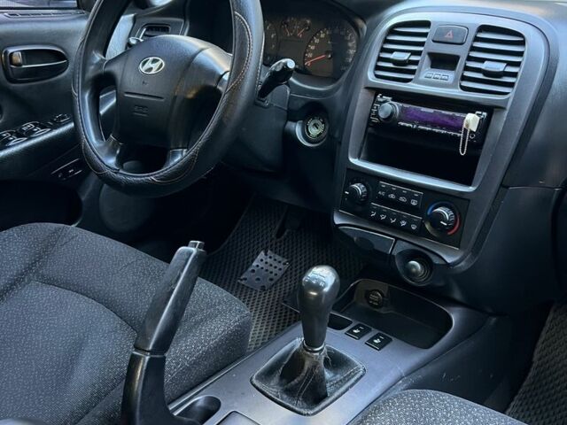 Синий Хендай Соната, объемом двигателя 2 л и пробегом 344 тыс. км за 3000 $, фото 10 на Automoto.ua