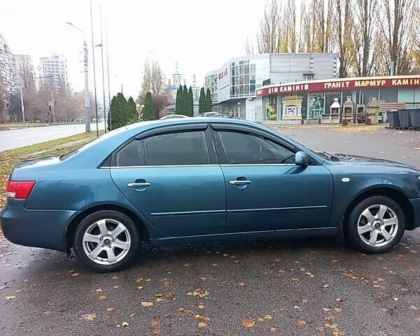 Синий Хендай Соната, объемом двигателя 2.36 л и пробегом 357 тыс. км за 4400 $, фото 12 на Automoto.ua