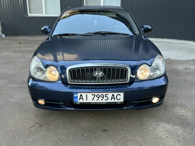 Синий Хендай Соната, объемом двигателя 2 л и пробегом 344 тыс. км за 3000 $, фото 2 на Automoto.ua