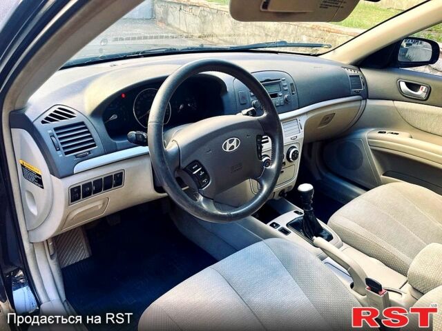 Синий Хендай Соната, объемом двигателя 2.4 л и пробегом 240 тыс. км за 3500 $, фото 3 на Automoto.ua