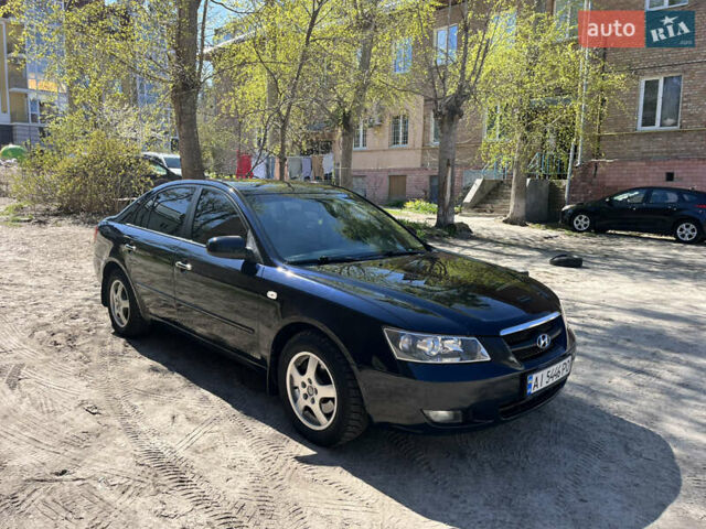 Синій Хендай Соната, об'ємом двигуна 2.4 л та пробігом 332 тис. км за 6100 $, фото 6 на Automoto.ua