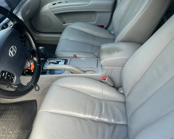 Синий Хендай Соната, объемом двигателя 2.36 л и пробегом 345 тыс. км за 5999 $, фото 13 на Automoto.ua