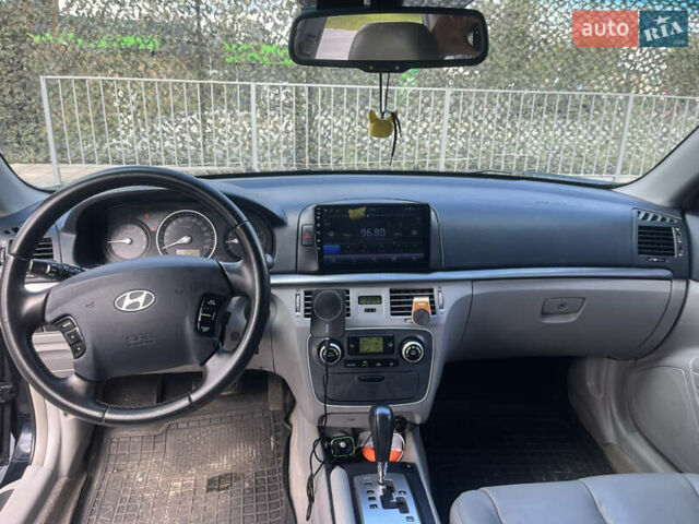 Синий Хендай Соната, объемом двигателя 2.36 л и пробегом 345 тыс. км за 5999 $, фото 12 на Automoto.ua