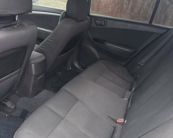 Синий Хендай Соната, объемом двигателя 2 л и пробегом 175 тыс. км за 5700 $, фото 6 на Automoto.ua