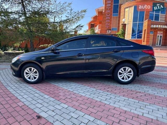 Синий Хендай Соната, объемом двигателя 2.4 л и пробегом 240 тыс. км за 6850 $, фото 3 на Automoto.ua