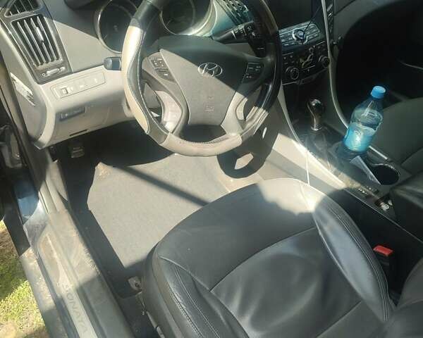 Синий Хендай Соната, объемом двигателя 2.36 л и пробегом 265 тыс. км за 7400 $, фото 6 на Automoto.ua