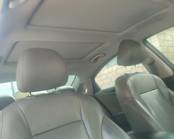 Синий Хендай Соната, объемом двигателя 2.36 л и пробегом 265 тыс. км за 7400 $, фото 7 на Automoto.ua