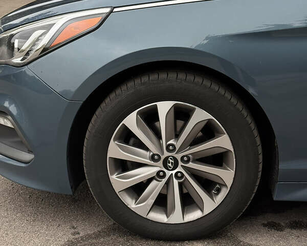 Синий Хендай Соната, объемом двигателя 2.36 л и пробегом 174 тыс. км за 12500 $, фото 14 на Automoto.ua