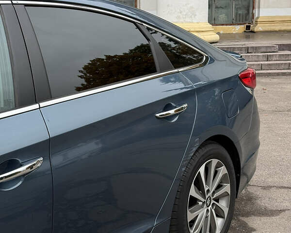 Синий Хендай Соната, объемом двигателя 2.36 л и пробегом 174 тыс. км за 12500 $, фото 1 на Automoto.ua