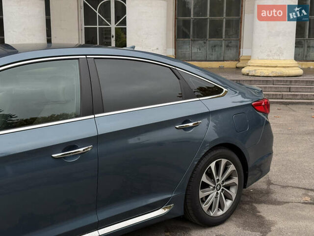 Синий Хендай Соната, объемом двигателя 2.36 л и пробегом 174 тыс. км за 12500 $, фото 3 на Automoto.ua