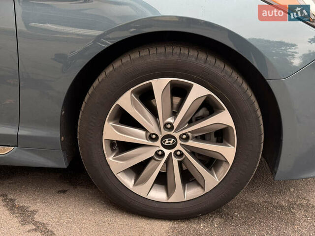 Синий Хендай Соната, объемом двигателя 2.36 л и пробегом 174 тыс. км за 12500 $, фото 17 на Automoto.ua