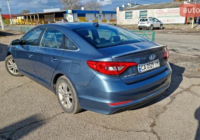 Синий Хендай Соната, объемом двигателя 2.36 л и пробегом 120 тыс. км за 10500 $, фото 3 на Automoto.ua