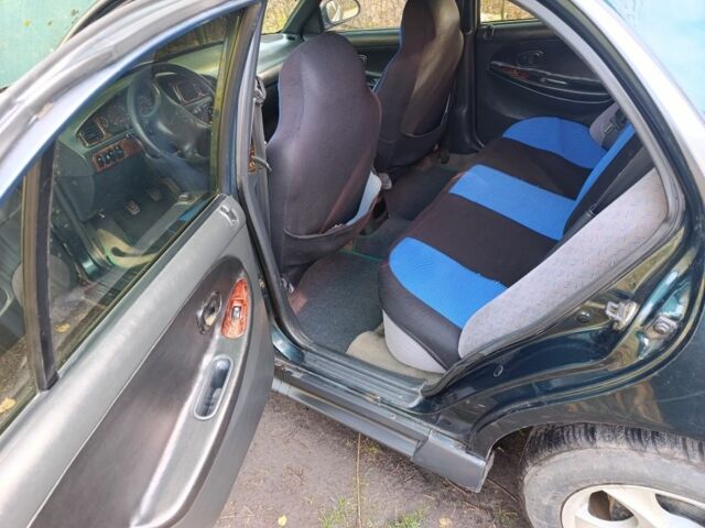 Зеленый Хендай Соната, объемом двигателя 2 л и пробегом 311 тыс. км за 1903 $, фото 5 на Automoto.ua