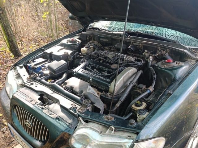 Зеленый Хендай Соната, объемом двигателя 2 л и пробегом 311 тыс. км за 1903 $, фото 7 на Automoto.ua